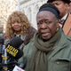 Plaintiffs Annette Richardson (left) and Stephanie Thomas, of New York City’s Fire Department, speak during a news conference on the steps of City Hall on Dec. 6, 2017, in New York City. (Richard Drew/AP Images)